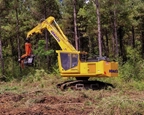 New Swing Machine picking up logs,Side of new Komatsu Swing Machine